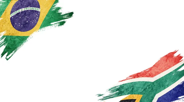 白色背景下的巴西和南非国旗 — 图库照片